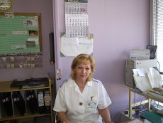 vrchní sestra E. Hudcová